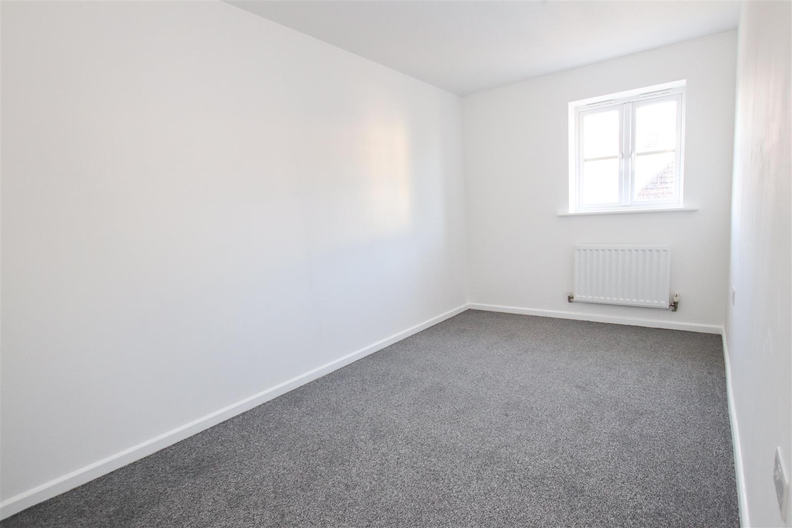 BEDROOM ONE (FRONT)